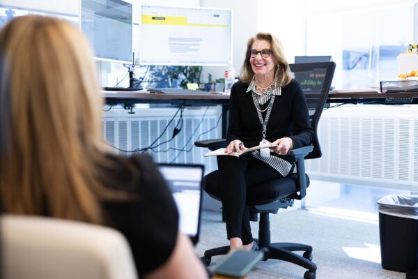 Avanti employees working together at corporate office.