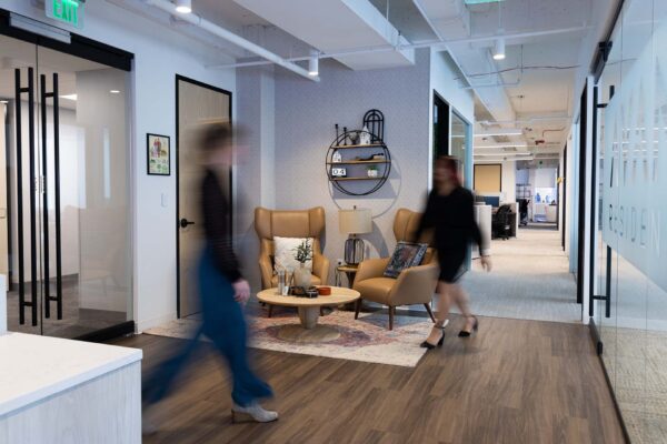 Avanti employees walking through corporate office.