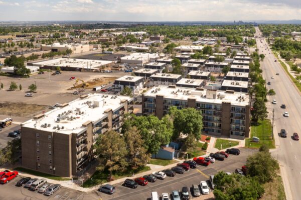 Beacon House apartments with classic brick construction, large balconies, and ample parking.