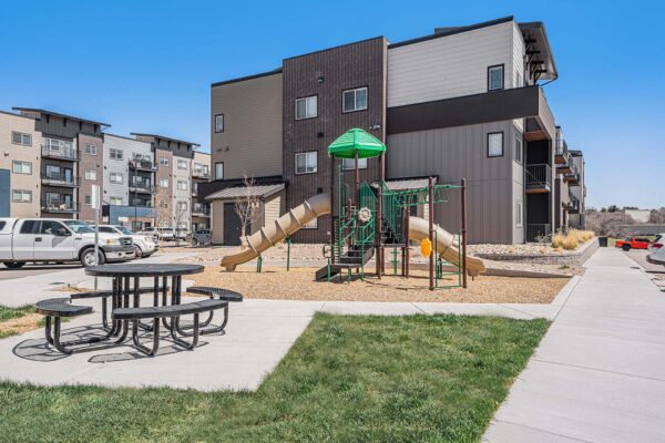 The Marc at Monument Ridge playground with play equipment.