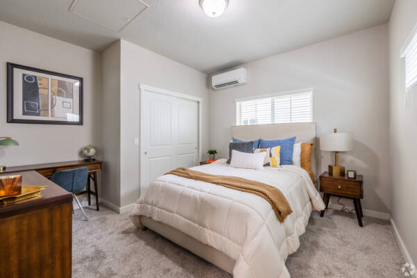 Bedroom with carpet and closet at Cottages at Abbott Station.