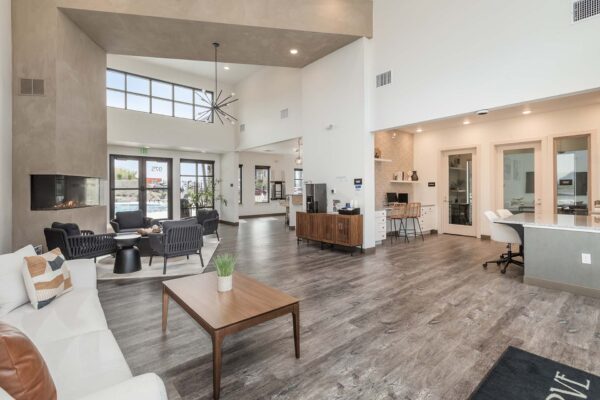 The Preserve at Mesa Creek clubhouse with seating area and leasing office.