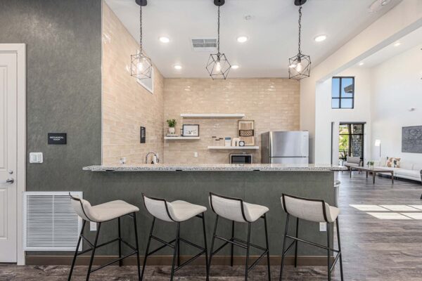 The Preserve at Mesa Creek community bar with stone counter and stools.